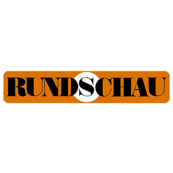 Orangefarbenes Rechteck mit dem Wort RUNDSCHAU in fetten schwarzen Buchstaben in der Mitte.